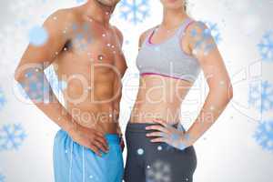 Mid section of a fit young couple