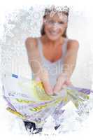 Composite image of portrait of a happy woman showing bank notes