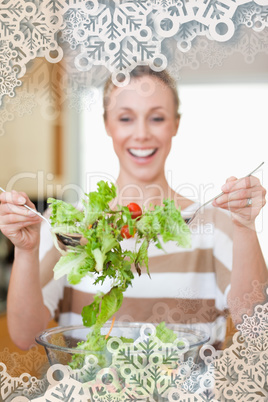 Salad being stirred by woman