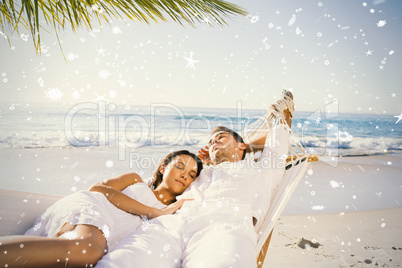 Calm couple napping in a hammock