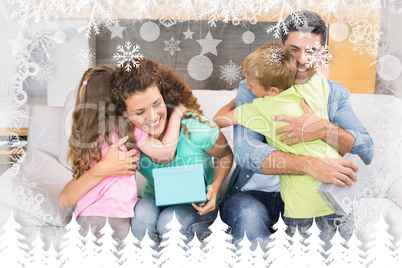 Composite image of young siblings giving presents to their paren