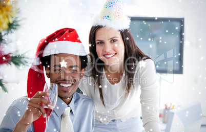 Business partners drinking to celebrates christmas