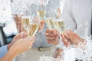 Composite image of hands toasting with champagne
