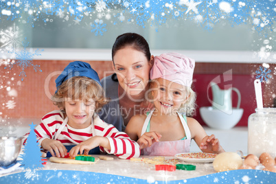 Happy mother baking with her children