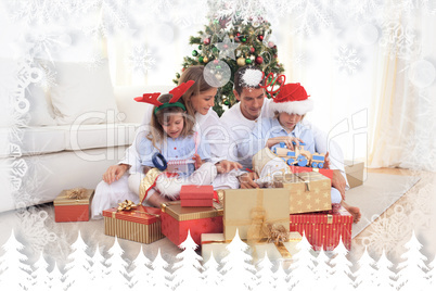 Composite image of young family unpacking christmas presents