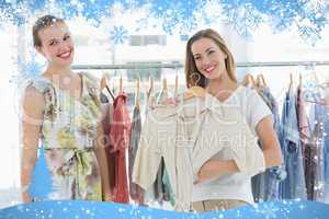 Composite image of young women shopping in clothes store