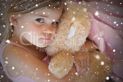 Close up portrait of a girl with stuffed toy