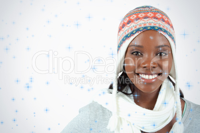 Smiling young woman with winter clothes on