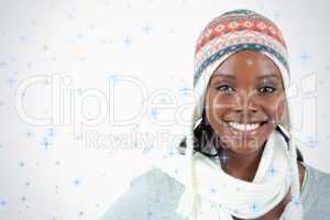 Smiling young woman with winter clothes on