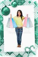 Composite image of beaming woman student with shopping bags