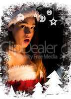 Composite image of amazed brunette in santa outfit opening a gif