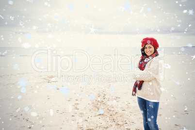 Portrait of a pretty woman in stylish warm wear at beach