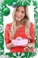 Composite image of blonde woman receiving a gift