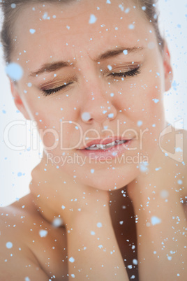 Composite image of woman with neck pain