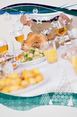 Turkey being carved at dinner table