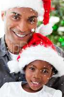 Composite image of portrait of a smiling father and daughter at