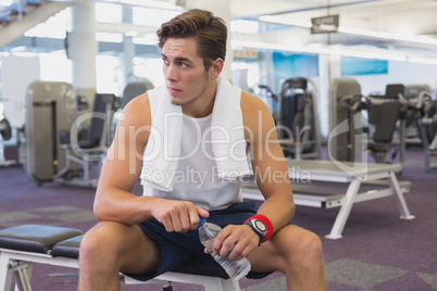 Fit man taking a break from working out