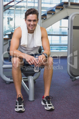 Fit man taking a break from working out