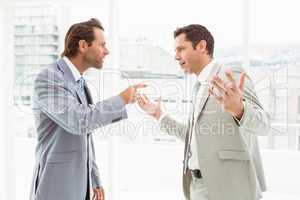Business colleagues in argument at office