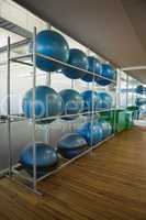 Exercise balls on rack in studio