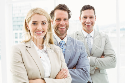 Confident happy young business people in office