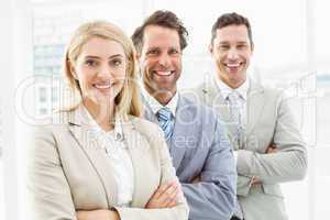 Confident happy young business people in office