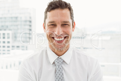 Close up portrait of happy businessman