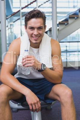 Fit man taking a break from working out