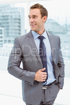 Smart businessman in suit at office