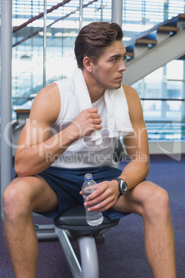 Fit man taking a break from working out