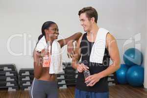 Personal trainer and client chatting