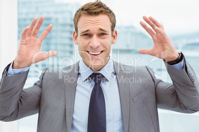 Angry young businessman at office