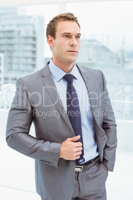 Smart businessman in suit at office