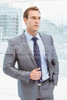 Smart businessman in suit at office