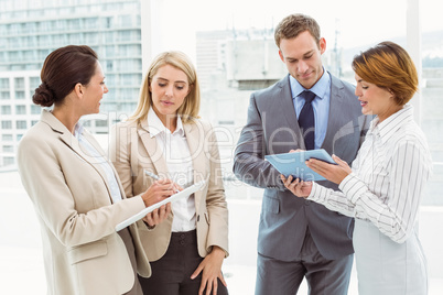 Colleagues in meeting at office