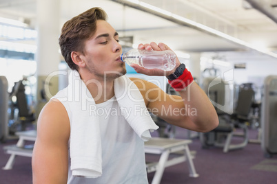 Fit man taking a break from working out