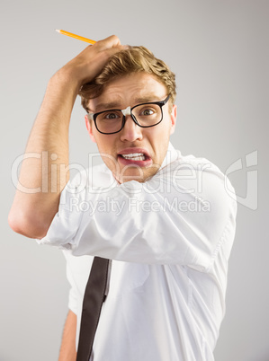 Geeky businessman looking stressed out