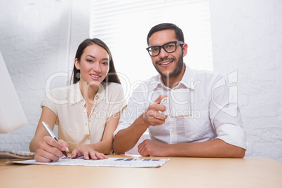 Casual colleagues in meeting at office