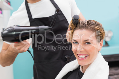 Woman getting her hair dried