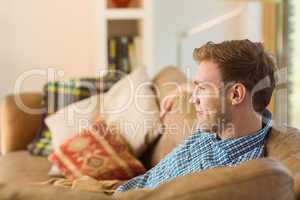 Young man relaxing on his couch