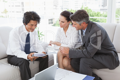 Business team looking over notes