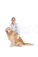 Smiling vet with a labrador