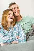 Cute couple relaxing on couch