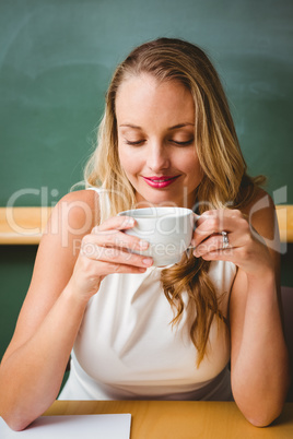 Beautiful businesswoman drinking coffee