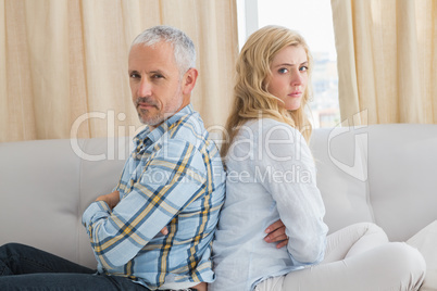 Couple arguing on the couch