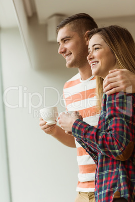 Cute couple looking out the window