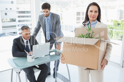 Unhappy businesswoman being let go