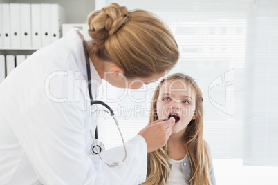 Doctor examining her patient