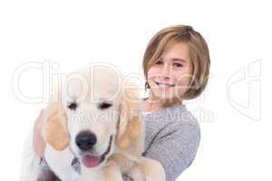 Portrait of cute boy carrying his dog