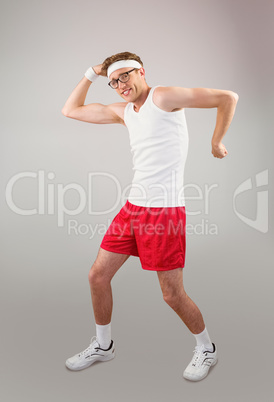 Geeky hipster posing in sportswear